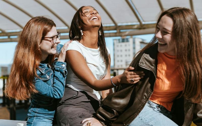 A group of women laughing.