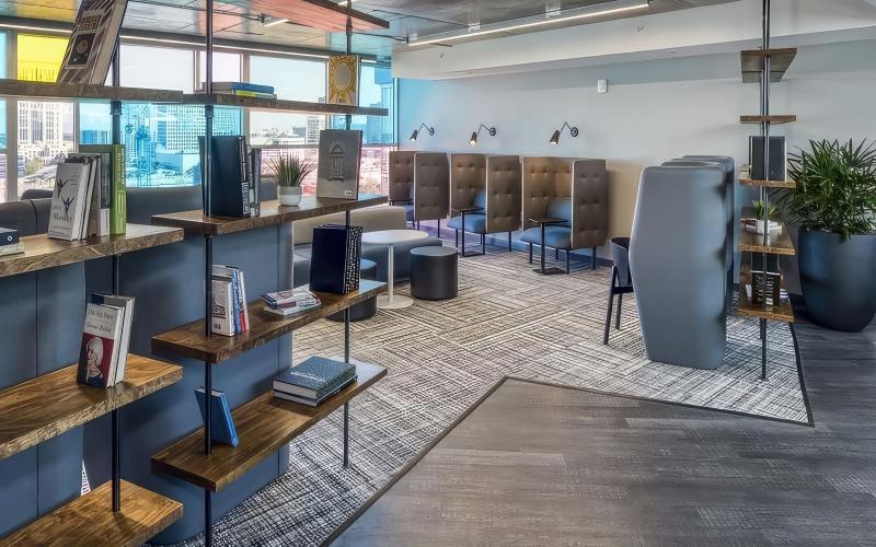 a room with shelves and a computer