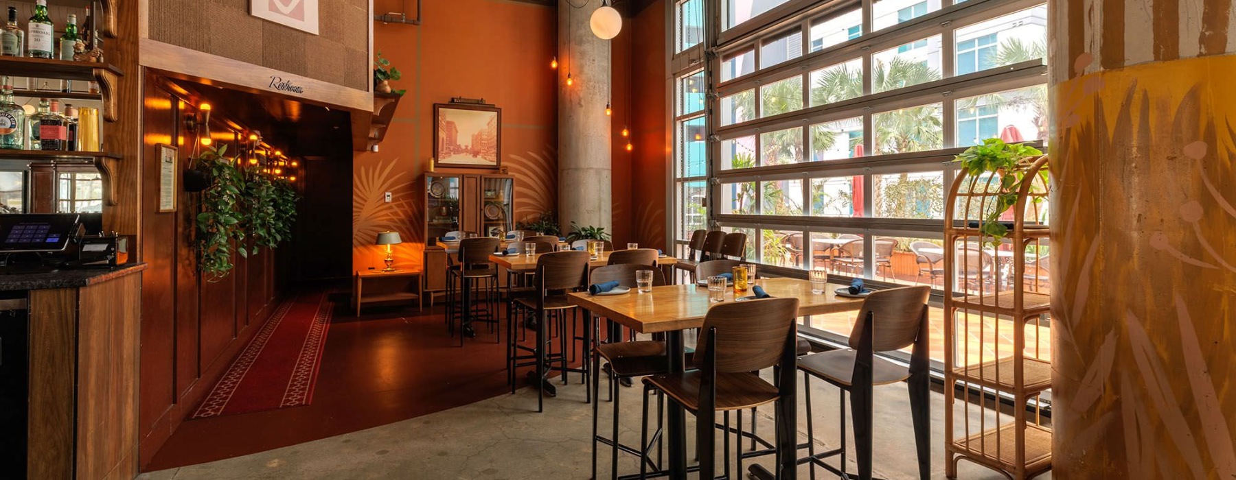 a restaurant with tables and chairs